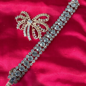 Unbranded Silver Tone Blue Rhinestone Bracelet & bow Brooch Set